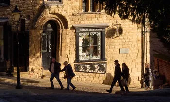 Steep hill Lincoln, Imperial Tea shop with passersby.jpg